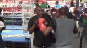 Roger and Jeff Mayweather padwork at the Mayweather Boxing Club